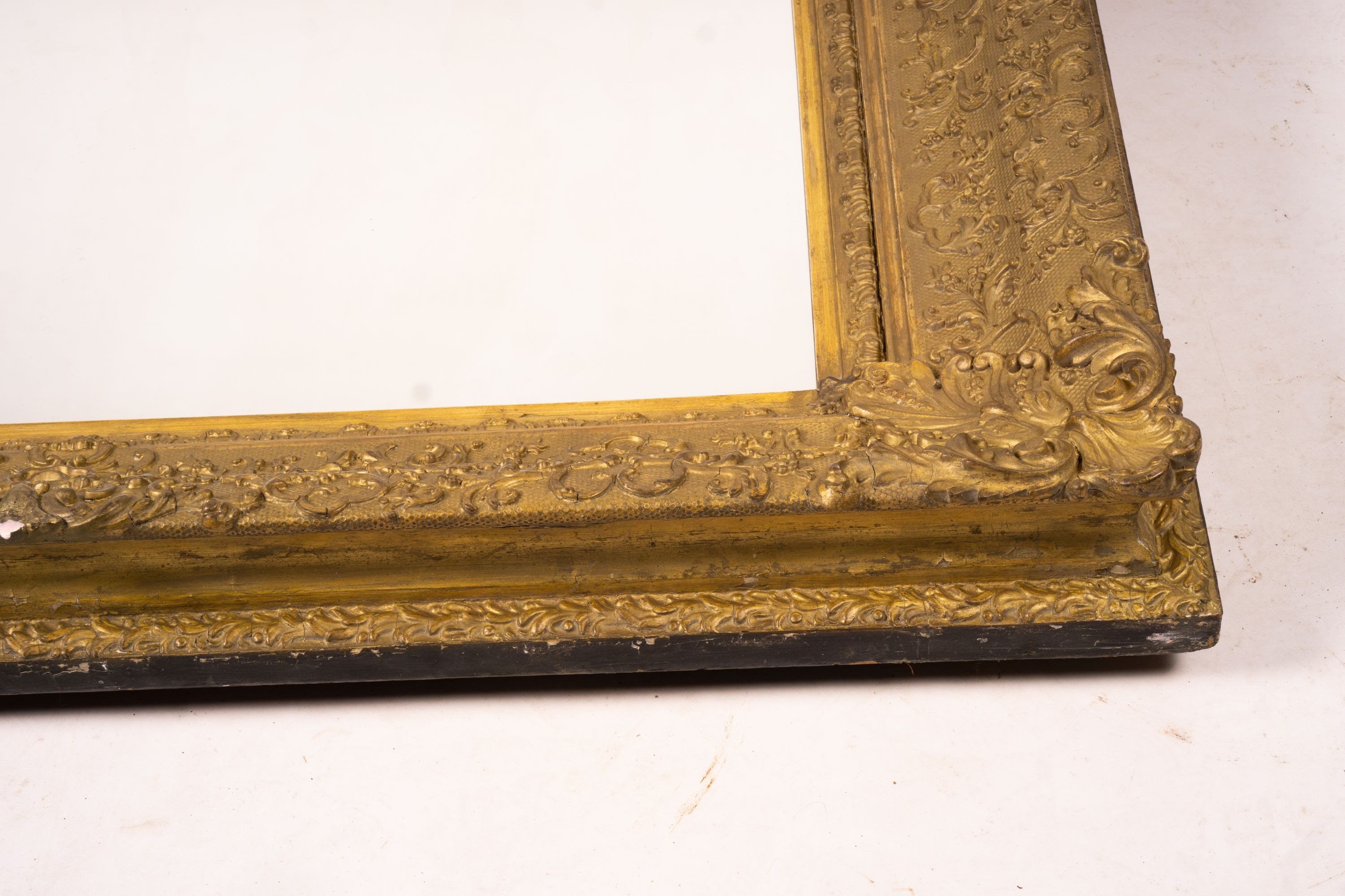 A Victorian gilt gesso wall mirror, W.104cm H.124cm